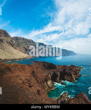 Rocky coast with turquoise sea, Acantilado de los Gigantes, cliffs of Los Gigantes, view from Punta de Teno, Tenerife Stock Photo