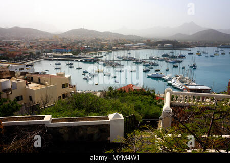 MINDELO, CAPE VERDE - DECEMBER 07, 2015: Marina of Sao Vicente island with boats and yachts and view of the Mindelo port city Stock Photo