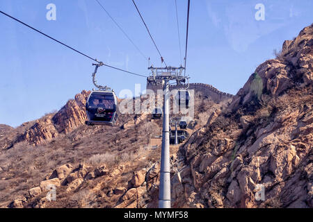 BADALING, CHINA - MARCH  13, 2016: Great Wall of China. A cable car taking visitors up to the Great Wall of China. Stock Photo