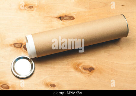 Brown paper tube for project documentation. Backround for branding mock-up Stock Photo