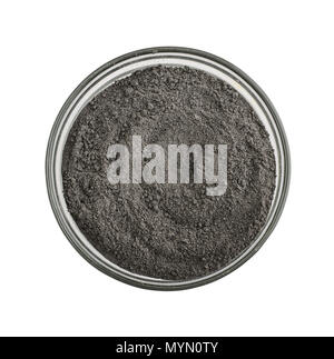 Black cosmetic clay powder in glass bowl isolated on white background, with clipping path Stock Photo