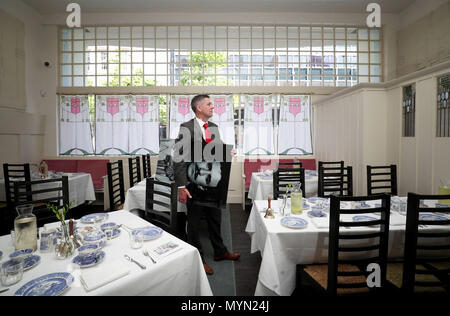 Building contractor Gerry Cummins, who helped refurbish the upgraded restaurant, Mackintosh at the Willow, at the original Willow Tea Rooms building in Glasgow, on the 150th anniversary of the birth of designer Charles Rennie Mackintosh, after &Acirc;£10 million restoration project. Stock Photo