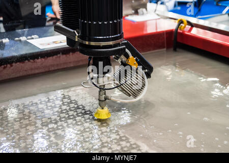Precision 5 axis cutting head with direct drive technology Stock Photo