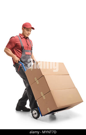 Mover with a hand truck loaded with boxes isolated on white background Stock Photo