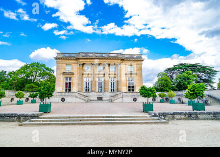 The West facade of the Petit Trianon, by Ange-Jacques Gabriel within the gardens of Versailles in France. Stock Photo