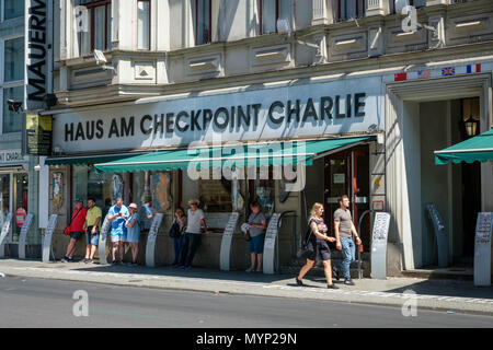 Berlin, Germany - june 2018: People in front of Haus am Checkpoint Charlie / Berlin wall museum  at former border of east and west Berlin Stock Photo
