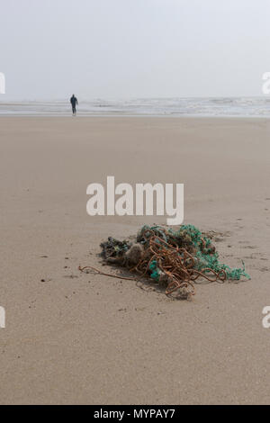 Plastic on the beach, Porthcawl, Mid Glamorgan, Wales, UK. 14th April 2018. UK. The end result of plastic and pollution on the planet. Stock Photo