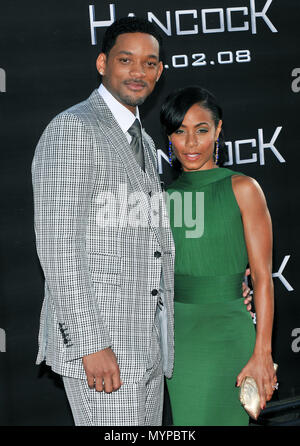 Will Smith  and wife Jada Pinkett-  Hancock LA premiere at the Chinese Theatre In Los Angeles.  three quarters eye contact smile01 SmithWill PinkettJada 01  Event in Hollywood Life - California, Red Carpet Event, USA, Film Industry, Celebrities, Photography, Bestof, Arts Culture and Entertainment, Celebrities fashion, Best of, Hollywood Life, Event in Hollywood Life - California, Red Carpet and backstage, Music celebrities, Topix, Couple, family ( husband and wife ) and kids- Children, brothers and sisters inquiry tsuni@Gamma-USA.com, Credit Tsuni / USA, 2006 to 2009 Stock Photo