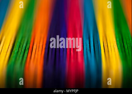 Close-up of multicolored sticks creating abstract patterns. Stock Photo