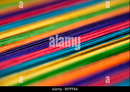 Close-up of multicolored sticks creating abstract patterns. Stock Photo