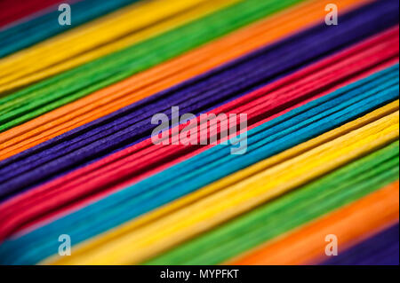 Close-up of multicolored sticks creating abstract patterns. Stock Photo