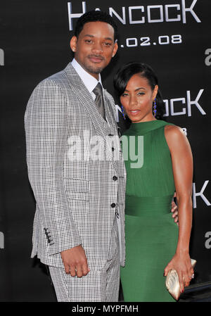 Will Smith and wife Jada Pinkett-  Hancock LA premiere at the Chinese Theatre In Los Angeles.  Three quarters eye contact 05 SmithWill PinkettJada 05  Event in Hollywood Life - California, Red Carpet Event, USA, Film Industry, Celebrities, Photography, Bestof, Arts Culture and Entertainment, Celebrities fashion, Best of, Hollywood Life, Event in Hollywood Life - California, Red Carpet and backstage, Music celebrities, Topix, Couple, family ( husband and wife ) and kids- Children, brothers and sisters inquiry tsuni@Gamma-USA.com, Credit Tsuni / USA, 2006 to 2009 Stock Photo