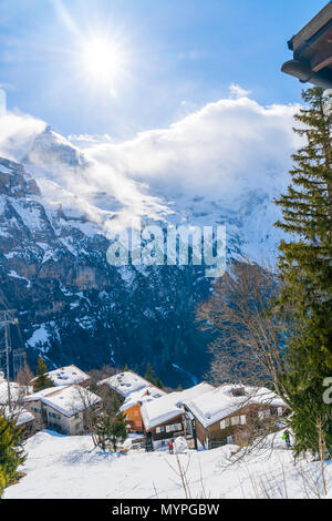 View of beautiful snow covered house at Murren mountain village in the Bernese Highlands of Switzerland Stock Photo