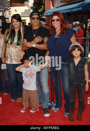 Slash and family  -  Mummy - Tomb Of The Dragon Emperor  Premiere at the Gibson Amphitheatre Theatre In Los Angeles.  full length eye contact smile 09 Slash wife kids 09  Event in Hollywood Life - California, Red Carpet Event, USA, Film Industry, Celebrities, Photography, Bestof, Arts Culture and Entertainment, Celebrities fashion, Best of, Hollywood Life, Event in Hollywood Life - California, Red Carpet and backstage, Music celebrities, Topix, Couple, family ( husband and wife ) and kids- Children, brothers and sisters inquiry tsuni@Gamma-USA.com, Credit Tsuni / USA, 2006 to 2009 Stock Photo