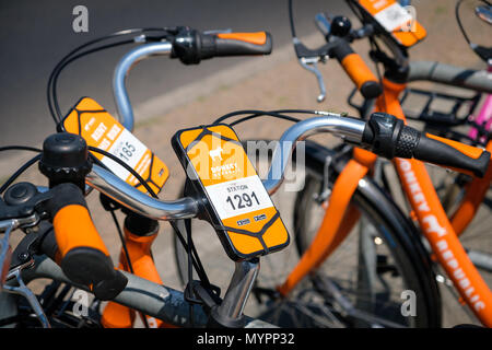 Berlin, Germany - june 2018: Donkey Republic bicycles for rent offering bike sharing   in the city of Berlin Stock Photo