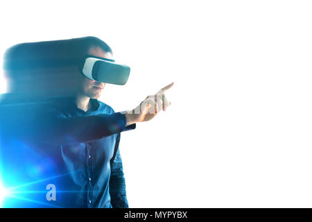 The man in the glasses of virtual reality. The concept of modern technologies and technologies of the future. VR glasses Stock Photo