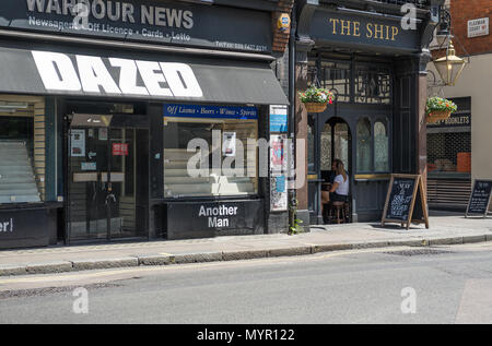 Wardour News newsagent shop and The Ship public house, Wardour Street, Soho, London, England, UK. Stock Photo