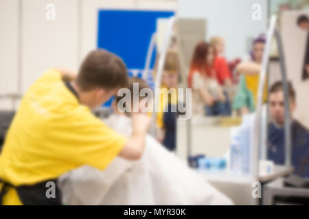 The blurred image in the barber shop. Stock Photo