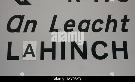 Irish road sign. Lahinch . Stock Photo