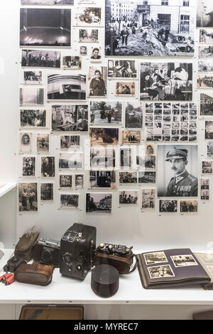 Warsaw Rising Museum, view of a display case containing artefacts and memorabilia donated by survivors' families after the 1944 people's uprising. Stock Photo