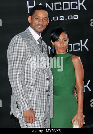 Will Smith  and wife Jada Pinkett-  Hancock LA premiere at the Chinese Theatre In Los Angeles.  three quarters eye contact smile17 SmithWill PinkettJada 17  Event in Hollywood Life - California, Red Carpet Event, USA, Film Industry, Celebrities, Photography, Bestof, Arts Culture and Entertainment, Celebrities fashion, Best of, Hollywood Life, Event in Hollywood Life - California, Red Carpet and backstage, Music celebrities, Topix, Couple, family ( husband and wife ) and kids- Children, brothers and sisters inquiry tsuni@Gamma-USA.com, Credit Tsuni / USA, 2006 to 2009 Stock Photo