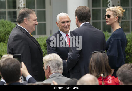 Washington, District of Columbia, USA. 7th June, 2018. United States Secretary of State Mike Pompeo(L), Vice President Mike Pence(2nd Left), Ambassador to Japan William Hagerty(2nd Right) and presidential advisor Ivanka Trump(Right) chat before the start of a news briefing with Presidential United States President Donald J. Trump and Japanese Prime Minister Shinzo Abe at the White House in Washington, DC, June 7, 2018. Credit: Chris Kleponis/CNP Credit: Chris Kleponis/CNP/ZUMA Wire/Alamy Live News Stock Photo