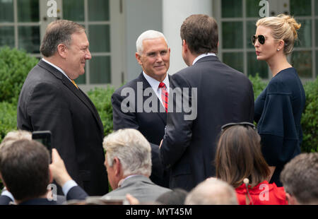 Washington, United States Of America. 07th June, 2018. United States Secretary of State Mike Pompeo(L), Vice President Mike Pence(2nd Left), Ambassador to Japan William Hagerty(2nd Right) and presidential advisor Ivanka Trump(Right) chat before the start of a news briefing with Presidential United States President Donald J. Trump and Japanese Prime Minister Shinzo Abe at the White House in Washington, DC, June 7, 2018. Credit: Chris Kleponis/CNP | usage worldwide Credit: dpa/Alamy Live News Stock Photo