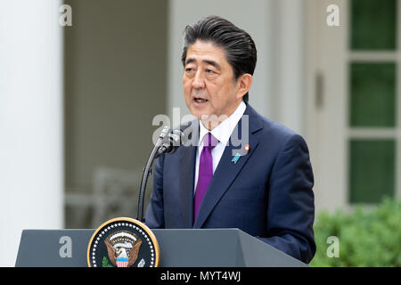Shinzo Abe, the Prime Minister of Japan, in the Rose Garden at the White House. US President Donald Trump and Japan's Prime Minister Shinzo Abe take part in a joint press conference in the Rose Garden of the White House.