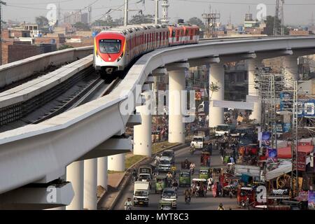 https://l450v.alamy.com/450v/myt8c3/beijing-china-16th-may-2018-photo-taken-on-may-16-2018-shows-the-orange-line-metro-train-olmt-during-a-test-run-in-eastern-pakistans-lahore-credit-jamil-ahmedxinhuaalamy-live-news-myt8c3.jpg