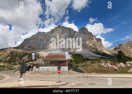 On top of Falzarego Pass road with Lagazuoi funicular and Lagazuoi mountain near Cortina d’Ampezzo at elevation 2117 m Stock Photo