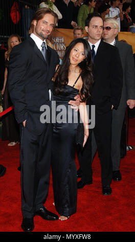 Josh Holloway and guest arriving at the 12th Annual Screen Actors Guild Awards at the Shrine Auditorium In Los Angeles, Sunday January 29, 2006HollowayJosh guest125  Event in Hollywood Life - California, Red Carpet Event, USA, Film Industry, Celebrities, Photography, Bestof, Arts Culture and Entertainment, Celebrities fashion, Best of, Hollywood Life, Event in Hollywood Life - California, Red Carpet and backstage, Music celebrities, Topix, Couple, family ( husband and wife ) and kids- Children, brothers and sisters inquiry tsuni@Gamma-USA.com, Credit Tsuni / USA, 2006 to 2009 Stock Photo