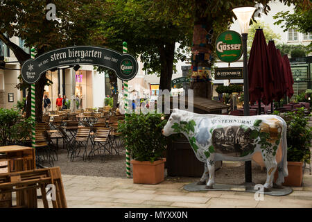 Outside the Sternbräu beer garden on Getreidegasse in Salzburg, Austria. Stock Photo