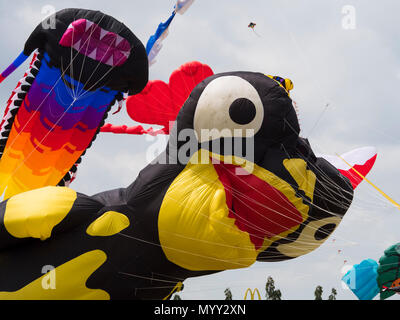 Large kites flying at the Pasir Gudang World Kite Festival in the Johor State of Malaysia. Stock Photo