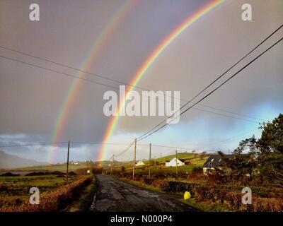 Co. Donegal, Ireland. 19th Dec, 2014. Weather in County Donegal Ireland. An  early morning rainbow appears near the village of Ardara. Credit:  Richard Wayman/StockimoNews/Alamy Live News Stock Photo