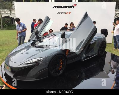 Singapore. 18th September 2015. Guests viewing the new McLaren 675LT after its first launch in Singapore by F1 driver Jenson Button Credit:  Chung Jin Mac / StockimoNews/Alamy Live News Stock Photo