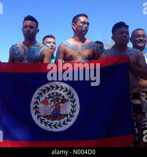 Yucatán, Mexico. 19th Sep, 2015. Players from Belize hold their national flag at the opening ceremony of the first ¨Pok Ta Pok¨ ritual Mayan ball game World Cup in Piste, Yucatan, Mexico, September 19, 2015. Credit:  Chico Sanchez / StockimoNews/Alamy Live News Stock Photo