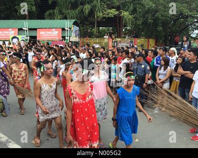 Minalin, Pampanga, Philippines. 01st Jan, 2016. 'Aguman Sandok' which started in 1932 is a festival every New Year's Day in Minalin, Philippines where straight men cross- dresses and go dancing on the streets to give laughters to their towns-mates. Credit:  Sherbien Dacalanio/StockimoNews/Alamy Live News Stock Photo