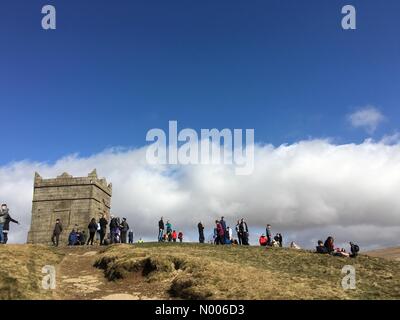 UK Weather sunny morning for Good Friday at Rivington Pike in Lancashire. Families making the annual Good Friday walk to the top of the Pike. Stock Photo