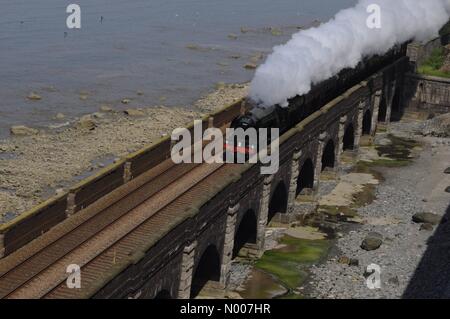 Pen-y-Clip viaduct near Penmaenmawr, North Wales, UK. 15th June, 2016. UK Weather. Flying Scotsman on route to Holyhead from London. Crossing over Pen-y-Clip viaduct near Penmaenmawr on the North Wales coast. Under sunny skies Credit:  Robert Eames / StockimoNews/Alamy Live News Stock Photo