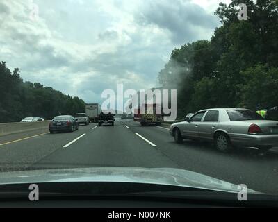 NJ Tpke, New Jersey, USA. 23rd June, 2016. Near Burlington Township New Jersey 23 June 2016: Firefighters fight a truck fire o.n the New Jersey turnpike. Marianne A. Campolongo/Alamy Live News Credit:  Marianne A. Campolongo/StockimoNews/Alamy Live News Stock Photo