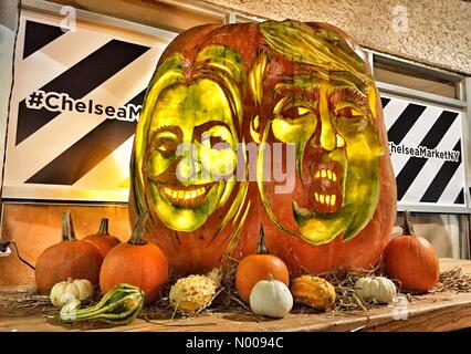 New York, USA. 28th Oct, 2016. Expert pumpkin carver Hugh McMahon carved the faces of Presidential candidates Hillary Clinton and Donald Trump into the side of a 275 pumpkin in New York City on October 28, 2016. Credit:  gadgetphoto/StockimoNews/Alamy Live News Stock Photo