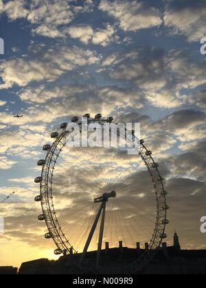 London, UK. 14th Dec, 2016. London Eye, sunrise with plane coming into City Airport. Credit:  Glenn Sontag/StockimoNews/Alamy Live News Stock Photo