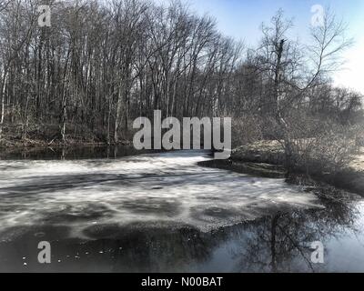 Jay St, Katonah, New York, USA. 24th Feb, 2017. Katonah New York 24th February 2017  Spring temperatures topping 70 degrees F melt ice at the John Jay Homestead. The remaining ice was a reminder it's still winter despite balmy weather. Credit: Marianne A. Campolongo/StockimoNews/Alamy Live News Stock Photo