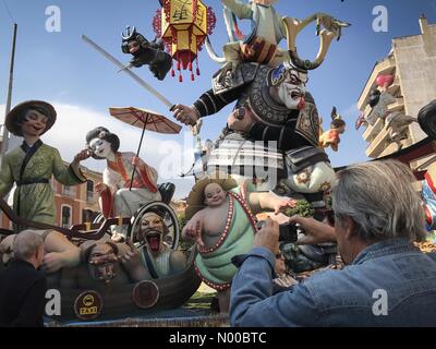 Dénia, Alicante, Spain. 17th Mar, 2017. Fallas in Denia, Spain. Tourists take photos of large Fallas monuments in the town. The Fallas monuments will be burnt on the last day of the fiesta. Credit: Scott Ramsey/StockimoNews/Alamy Live News Stock Photo