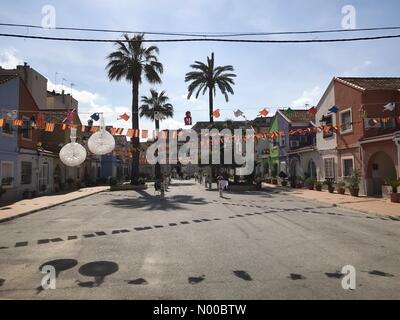 Dénia, Alicante, Spain. 17th Mar, 2017. Fallas in Denia, Spain. Home made bunting hangs across a courtyard in the town to celebrate Fallas. Credit: Scott Ramsey / StockimoNews/Alamy Live News Stock Photo