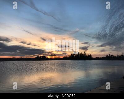 Godalming, UK. 26th Mar, 2017. UK Weather: Sunset over Godalming.  High pressure anticyclonic conditions over the Home Counties today. Sunset over Godalming in Surrey. Credit: jamesjagger/StockimoNews/Alamy Live News Stock Photo