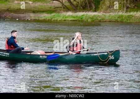 Hay on Wye, Powys, Wales - Bank Holiday April 2017 a couple canoeing on the River Wye on a cool overcast day. Stock Photo