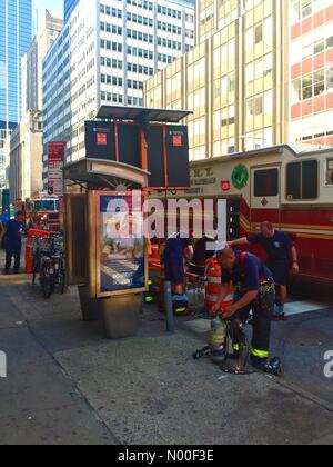 New York City, USA. 13th Jun, 2017. Firemen working at World Trade Center Street Explosion during a Heat Wave Credit: Linda Gerardi/StockimoNews/Alamy Live News Stock Photo