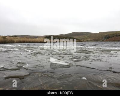 Mynydd Epynt, Powys, UK. 13th January 2018. Ice is seen on a lake on the Mynydd Epynt range in Powys, after recent freezing weather. Credit: Graham M. Lawrence/StockimoNews/Alamy Live News Stock Photo