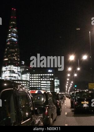 Black cabs protesting on London Bridge on Thursday 18 January 2018, London, uk Stock Photo